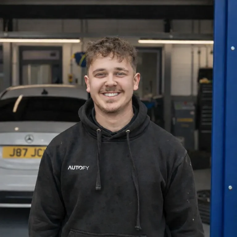 Automotive technician in workshop